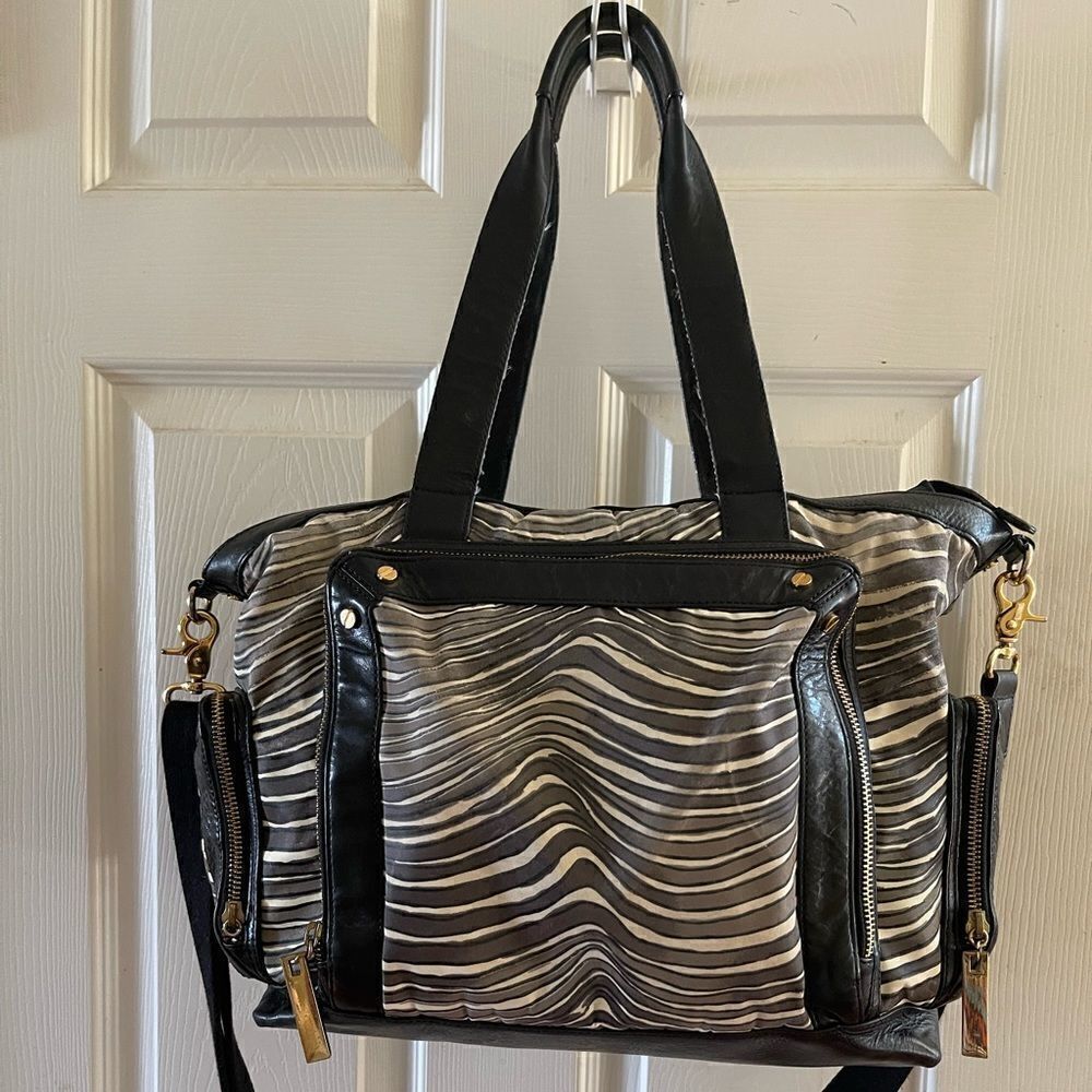 - Tory Burch Nylon Zebra prints & black leather   Weekender bag with shoul…